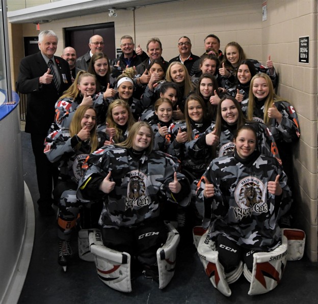 Bruce with the Haldimand River Cats girls hockey team